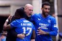 Rangers manager Philippe Clement congratulates Rabbi Matondo on his injury-time equaliser against Celtic at Ibrox today with Connor Goldson