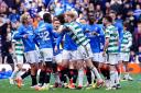 Rangers and Celtic players square up to each other after the final whistle at Ibrox yesterday