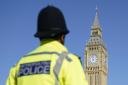 File photograph of a police officer outside the Palace of Westminster
