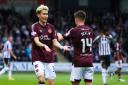 Kyosuke Tagawa celebrates his first league goal for Hearts with Cammy Devlin