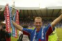 Peter Lovenkrands celebrates with the Scottish Cup