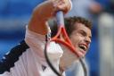 Murray claims victory over Berdych with a little help from Kenny Rogers