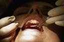 Unregistered dentist sorry for 'stupid mistake'
