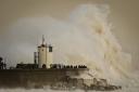 STORM CHAOS: The flooding in the south of England continued as the gales swept over the country.