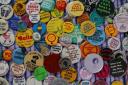 The badges on show at Glasgow Women's Library provoke, amuse and empower. Photograph: Colin Mearns