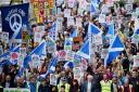 GLASGOW, SCOTLAND - APRIL 04:  Demonstrators march in Glasgow to call for the scrapping of Britain's Trident nuclear weapons programme on April 4, 2015 in Glasgow, Scotland. Thousands attended the rally in a public demonstration to call for the scrapping 