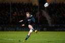 Glasgow Warriors' Finn Russell converts a kick during their 26-15 defeat by Northampton