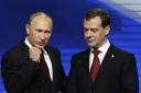 Russia's President Dmitry Medvedev (R) and Prime Minister Vladimir Putin REUTERS/Sergei Karpukhin