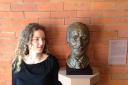 Alison Grieve beside the bust of her grandfather at the Scottish National Portrait Gallery.