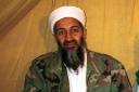 FILE - This undated photo shows al-Qaida leader Osama bin Laden in Afghanistan. A person familiar with developments on Sunday, May 1, 2011 says bin Laden is dead and the U.S. has the body. (AP Photo)
