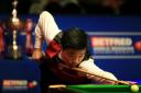 Ding Junhui at the table during the final against Mark Selby on day sixteen of the Betfred Snooker World Championships at the Crucible Theatre, Sheffield. PRESS ASSOCIATION Photo. Picture date: Sunday May 1, 2016. See PA story SNOOKER World. Photo credit 