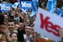 Supporters at a Yes Rally in George Square ahead of voting in the Scottish Referendum on September18th. PRESS ASSOCIATION Photo. Picture date: Tuesday September 16, 2014. See PA story REFERENDUM Main. Photo credit should read: Andrew Milligan/PA Wire