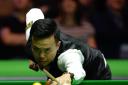 Marco Fu turned on the style to reel in John Higgins. Picture: PA