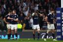 Scotland players look shattered after they were demolished by England at Twickenham. Picture: Getty Images