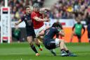 Wales' Jonathan Davies is tackled by France's Kevin Gourdon and Brice Dulin during the RBS 6 Nations match at the Stade de France, Paris. PRESS ASSOCIATION Photo. Picture date: Saturday March 18, 2017. See PA story RUGBYU France. Photo credit shou