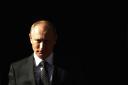 Russia's President Vladimir Putin leaves Downing Street, in central London June 16, 2013. Putin met Britain's Prime Minister David Cameron ahead of the G8 summit in Northern Ireland.  REUTERS/Luke MacGregor (BRITAIN - Tags: POLITICS) - RTX10PVL.