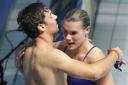 Tom Daley and Grace Reid celebrate their silver medal in the 3m mixed synchro event at the World Championships in Budapest