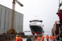 The ferry MV Glen Sannox travels down the slipway at the launch ceremony for the liquefied natural gas passenger ferry, the UK's first LNG ferry, at Ferguson Marine Engineering in Port Glasgow.