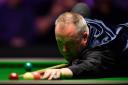 John Higgins is a study of concentration during his quarter-final victory over Wales' Ryan Day. Picture: Getty Images