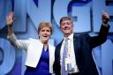 First Minister Nicola Sturgeon with the party's newly deputy leader Keith Brown on stage during the SNP spring conference in Aberdeen in 2018. Photo Jane Barlow/PA.
