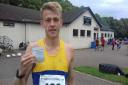 Luke Traynor with his official time of 28:32 at the Brian Goodwin Memorial 10k
