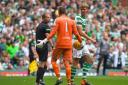 02/09/18 LADBROKES PREMIERSHIP. CELTIC V RANGERS (1-0). CELTIC PARK - GLASGOW . Celtic's Kristoffer Ajer (right) exchanges words with Rangers' Allan McGregor after they come together on the deck.