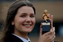 Rachel Cronin, a sixth-year-pupil at Edinburgh's Royal High School, with her Herald Little Cherub award for her published review of Edinburgh International Festival opera La Cenerentola as part of the EIF and the Herald's Festival Schools programm