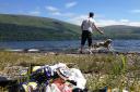 Loch Lomond litter rubbish mess west side looking out to Ben Lomond.