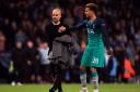 Manchester City manager Pep Guardiola and Tottenham Hotspur's Dele Alli after the UEFA Champions League quarter final second leg match at the Etihad Stadium, Manchester