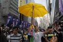 A protester in Hong Kong holds his umbrella aloft. Picture: Vincent Yu/AP.