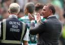 Brendan Rodgers, right, applauds the Celtic fans at Parkhead on Saturday after his side's 2-1 win over Rangers