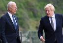 US President Joe Biden (left) talks with Prime Minister Boris Johnson, during a walk outside Carbis Bay Hotel, Carbis Bay, Cornwall, ahead of the G7 summit in Cornwall