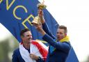 Justin Rose and Henrik Stenson (right) celebrate winning the Ryder Cup at Le Golf National, Saint-Quentin-en-Yvelines, Paris in 2018. Credit: PA