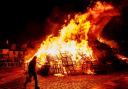 Biggar bonfire alight on Hogmanay after lighting by resident Alan Michie in 2018. Picture credit: Andrew Wilson / Alamy Stock Photo