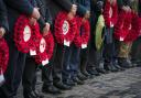Dignitaries with poppy wreaths during the Remembrance Sunday service and parade in Edinburgh