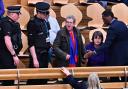 Police and security staff remove protesters from the public gallery of the Scottish Parliament after they interrupted proceedings, as the vote on the controversial Gender Recognition Reform (Scotland) Bill was taking place on December 22, 2022 in