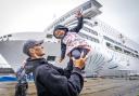 Two-year old Oleksandra Kuleshyna with her father Igor Kuleshyn, from the Freedom Ballet of Ukraine,  alongside MS Victoria in the Port of Leith, Edinburgh.