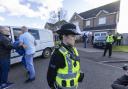 Police during the raid on Nicola Sturgeon's home