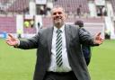 Celtic manager Ange Postecoglou hails the Parkhead club's fans at Tynecastle today