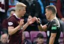 Hearts defender Alex Cochrane protests his innocence to referee Nick Walsh at Tynecastle on Sunday