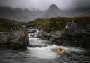 A swimmer in the Fairy Pools