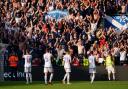 Scotland's players applaud their fans after their 2-1 win over Norway in Oslo tonight