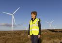 Former First Minister Nicola Sturgeon in a past visit to a wind farm