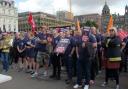 Members of the Fire Brigades Union (FBU) across Scotland gather for a rally at George Square in Glasgow