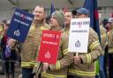 Firefighters from the Fire Brigades Union (FBU) take part in the Cuts Leave Scars rally outside the Scottish Parliament in Edinburgh