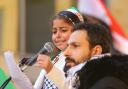 Pro-Palestinan demonstration at the Buchanan Street steps in Glasgow. Jeewan Wadi age 8 from Gaza City pictured speaking to the crowd. Her father Wesam is pictured with her