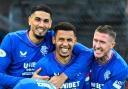 Leon Balogun, left, James Tavernier, centre, and John Lundstram, right, celebrate during Rangers' win over Hearts in the Viaplay Cup semi-final at Hampden earlier this month