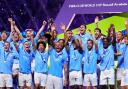 Manchester City’s Kyle Walker lifts the Club World Cup trophy (Manu Fernandez/AP)