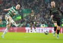 Celtic winger Daizen Maeda, left, takes a shot in the cinch Premiership game against Livingston at Parkhead