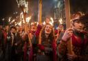 Vikings from the Shetland South Mainland Up Helly Aa Jarl Squad lead the torchlight procession through Edinburgh city centre, the opening event for the Hogmanay celebrations